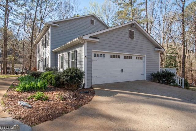 207 Lakeshore Way, Lagrange, GA 30240 - view of side of property with driveway and a garage