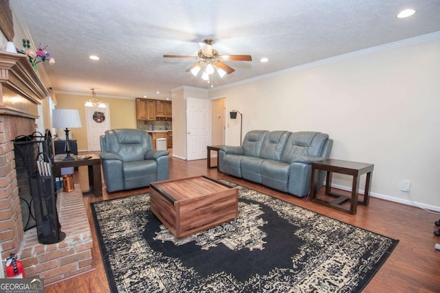 207 Lakeshore Way, Lagrange, GA 30240 - living room with a ceiling fan, a brick fireplace, crown molding, recessed lighting, and wood finished floors