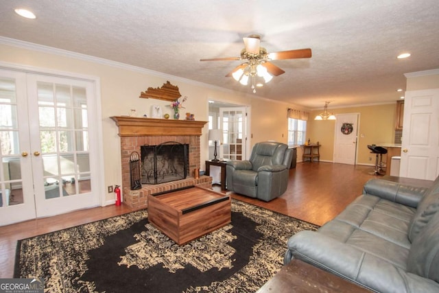 207 Lakeshore Way, Lagrange, GA 30240 - living area with french doors, ceiling fan, wood finished floors, a textured ceiling, and ornamental molding