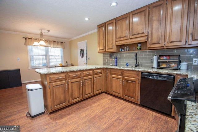207 Lakeshore Way, Lagrange, GA 30240 - kitchen with dishwasher, a peninsula, light wood-style floors, brown cabinetry, and ornamental molding
