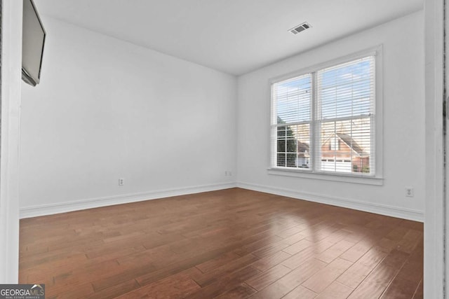 675 Timber Ives Dr, Dacula, GA 30019 - spare room featuring dark wood finished floors and baseboards