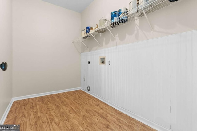675 Timber Ives Dr, Dacula, GA 30019 - laundry area featuring hookup for an electric dryer, hookup for a washing machine, light wood-type flooring, and baseboards