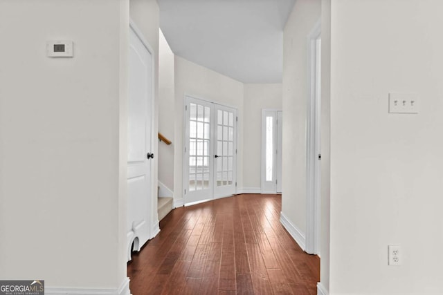 675 Timber Ives Dr, Dacula, GA 30019 - corridor featuring dark wood-style floors, stairway, baseboards, and french doors