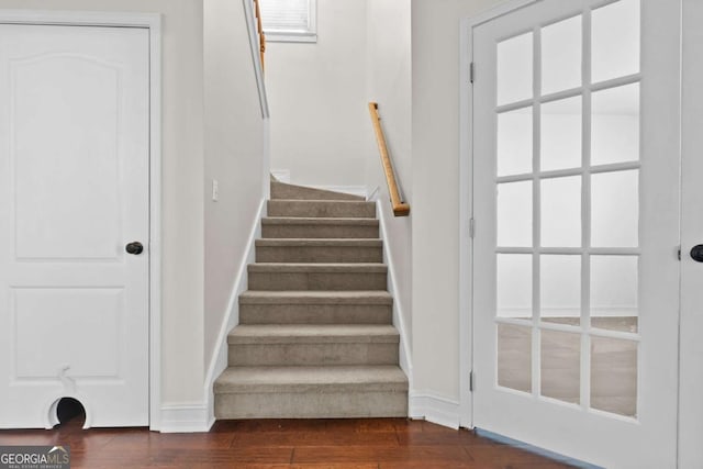 675 Timber Ives Dr, Dacula, GA 30019 - stairway with wood finished floors and baseboards
