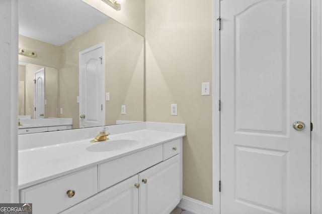 675 Timber Ives Dr, Dacula, GA 30019 - bathroom featuring vanity and baseboards