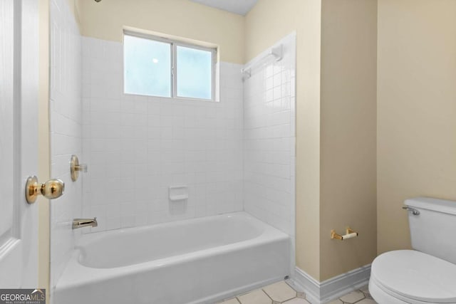 675 Timber Ives Dr, Dacula, GA 30019 - bathroom with toilet, tile patterned floors, bathing tub / shower combination, and baseboards