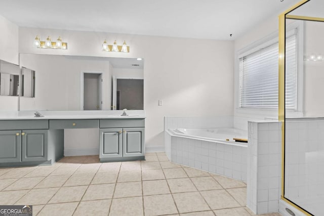 675 Timber Ives Dr, Dacula, GA 30019 - bathroom with double vanity, a garden tub, tile patterned floors, and a shower