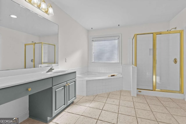 675 Timber Ives Dr, Dacula, GA 30019 - full bathroom featuring vanity, a shower stall, a bath, and tile patterned flooring
