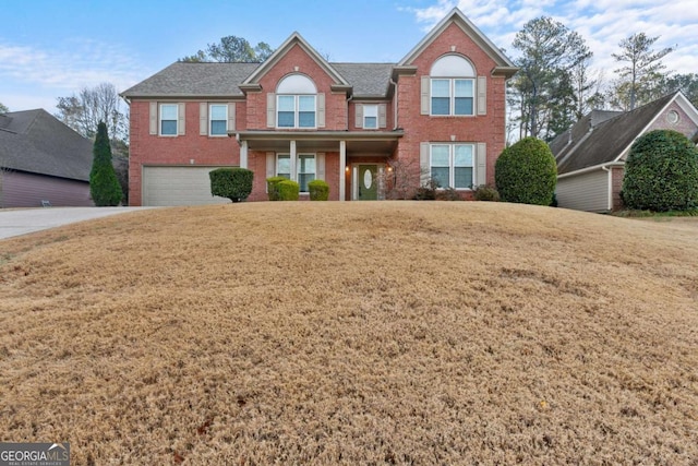 675 Timber Ives Dr, Dacula, GA 30019 - view of front of property with a garage, a front lawn, driveway, and brick siding