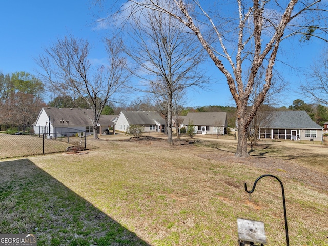 view of yard featuring fence