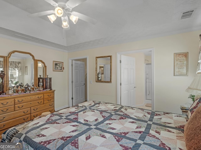 bedroom featuring ceiling fan, visible vents, and ornamental molding