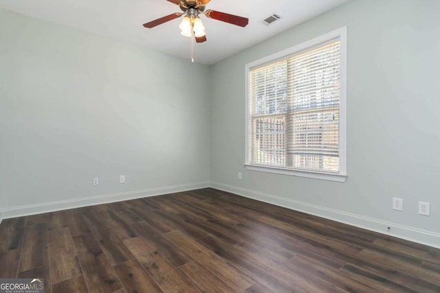 full bath with shower / bath combination, vanity, tile patterned flooring, and toilet