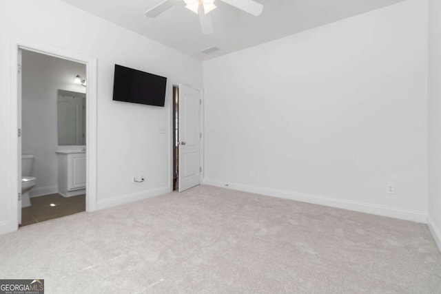 unfurnished room with crown molding, baseboards, and wood finished floors