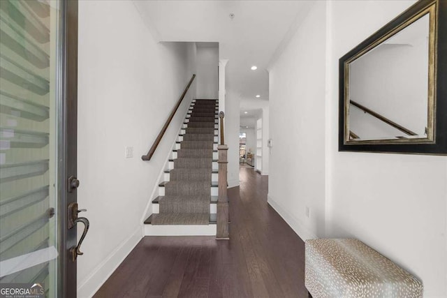 entrance foyer with stairway, recessed lighting, baseboards, and wood finished floors
