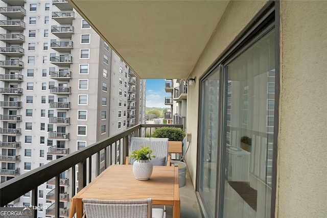 balcony featuring central air condition unit
