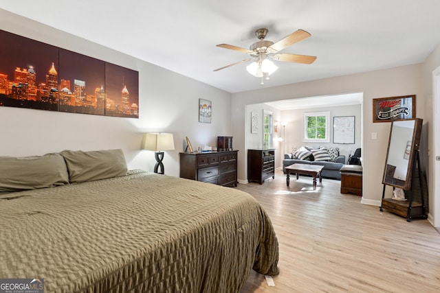 1291 Marcelle Heights Pl, Norcross, GA 30093 - bedroom with light wood-type flooring, baseboards, and a ceiling fan