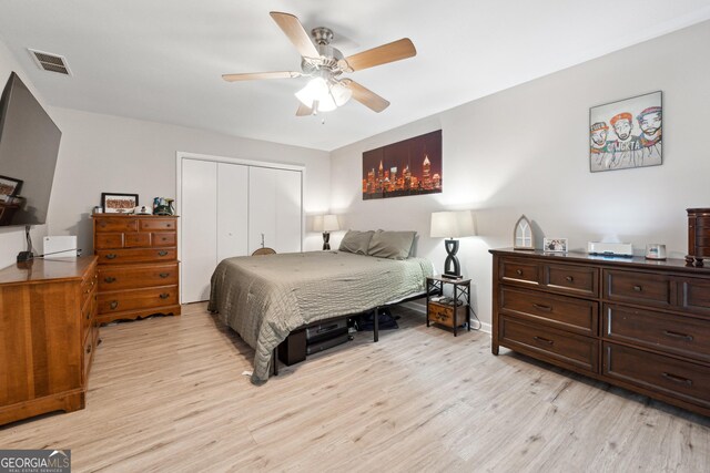1291 Marcelle Heights Pl, Norcross, GA 30093 - bedroom with a closet, light wood-style flooring, ceiling fan, and baseboards
