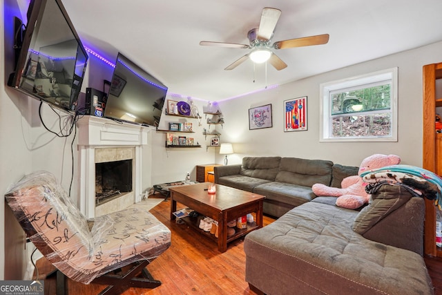 1291 Marcelle Heights Pl, Norcross, GA 30093 - living room featuring wood finished floors, a fireplace, and a ceiling fan