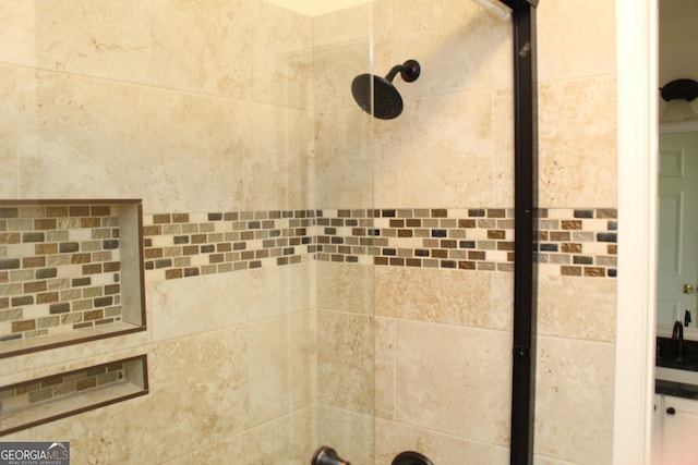 details with a tile shower