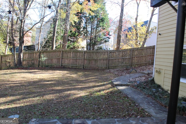 view of yard featuring fence