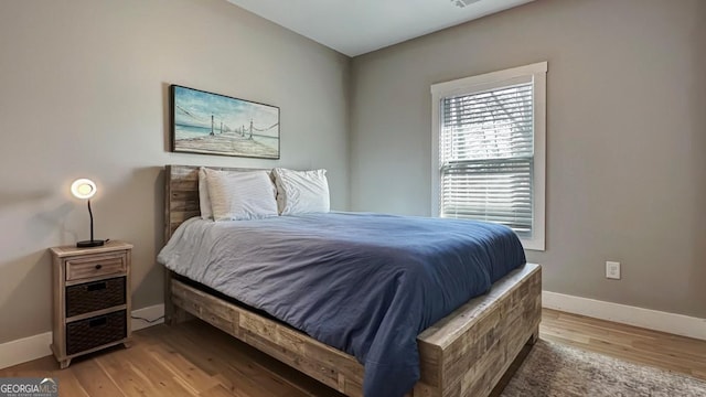 360 Prince Dr, Morganton, GA 30560 - bedroom with visible vents, baseboards, and light wood-style floors