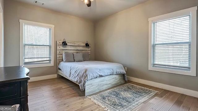 360 Prince Dr, Morganton, GA 30560 - bedroom with visible vents, ceiling fan, baseboards, and wood finished floors