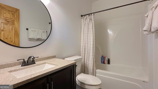 360 Prince Dr, Morganton, GA 30560 - bathroom featuring vanity, shower / bath combination with curtain, and toilet