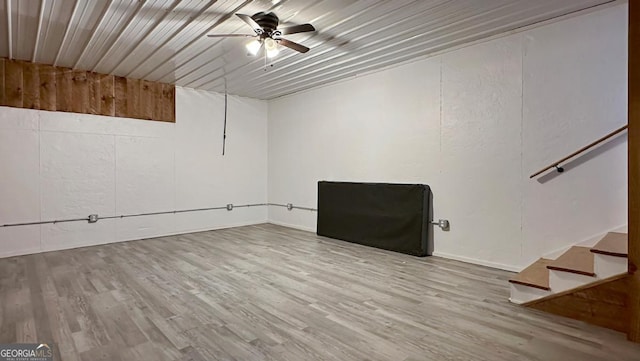 360 Prince Dr, Morganton, GA 30560 - below grade area with ceiling fan, wood finished floors, and stairs