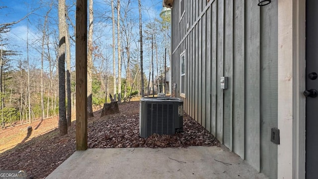 360 Prince Dr, Morganton, GA 30560 - view of home's exterior featuring a patio area, central air condition unit, and board and batten siding