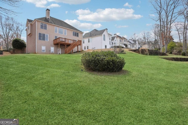 view of yard featuring a deck