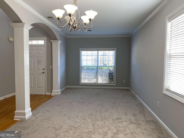 1295 Leisure Lake Dr, Lawrenceville, GA 30044 - entrance foyer featuring carpet, decorative columns, visible vents, and arched walkways
