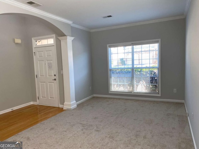 1295 Leisure Lake Dr, Lawrenceville, GA 30044 - unfurnished room with visible vents, crown molding, and ornate columns
