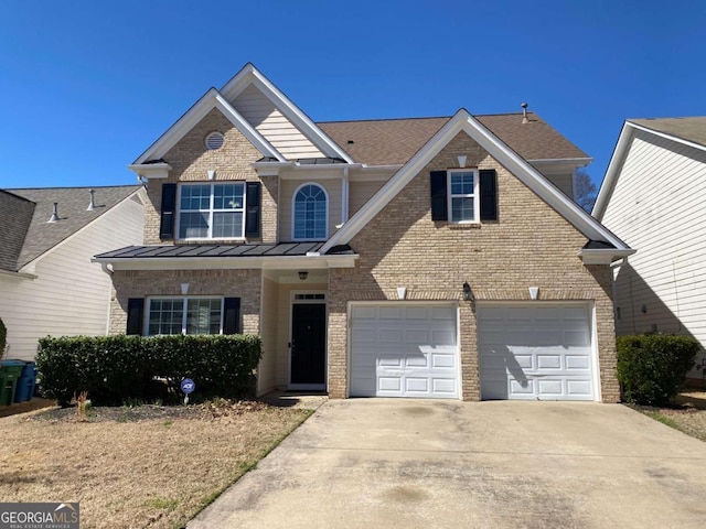 1295 Leisure Lake Dr, Lawrenceville, GA 30044 - traditional-style home with concrete driveway, brick siding, and roof with shingles