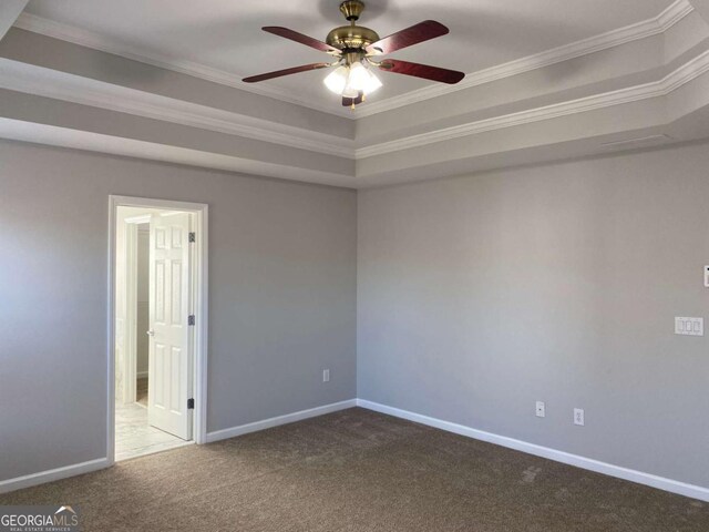 1295 Leisure Lake Dr, Lawrenceville, GA 30044 - carpeted empty room with baseboards, a ceiling fan, and ornamental molding