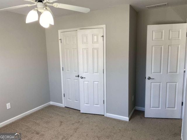 1295 Leisure Lake Dr, Lawrenceville, GA 30044 - unfurnished bedroom with a closet, carpet flooring, baseboards, and visible vents