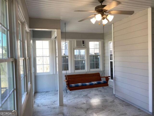 1295 Leisure Lake Dr, Lawrenceville, GA 30044 - unfurnished sunroom featuring a wall unit AC