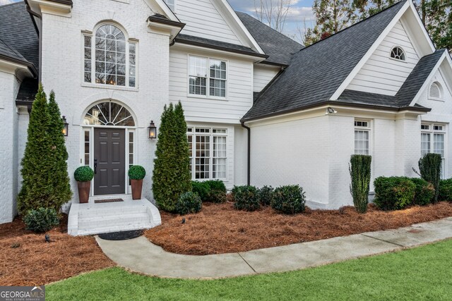 8625 Anchor On Lanier Ct, Gainesville, GA 30506 - french provincial home with brick siding and roof with shingles