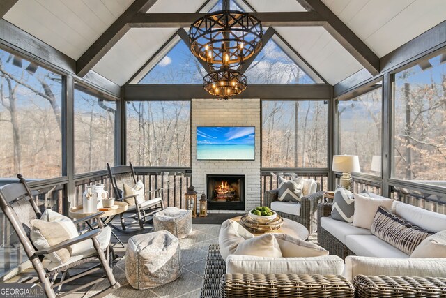 8625 Anchor On Lanier Ct, Gainesville, GA 30506 - sunroom / solarium with a chandelier and an outdoor living space with a fireplace
