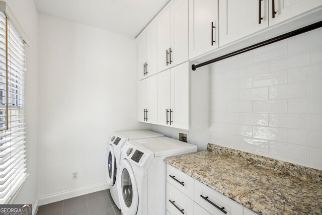 8625 Anchor On Lanier Ct, Gainesville, GA 30506 - laundry room with cabinet space, washer and dryer, baseboards, and dark tile patterned floors