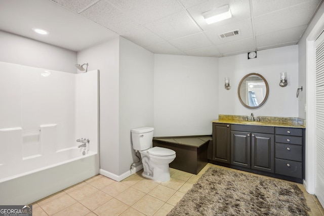8625 Anchor On Lanier Ct, Gainesville, GA 30506 - bathroom featuring a paneled ceiling, toilet, vanity, tub / shower combination, and tile patterned floors