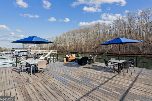 8625 Anchor On Lanier Ct, Gainesville, GA 30506 - wooden deck featuring outdoor dining space