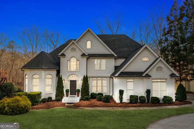 8625 Anchor On Lanier Ct, Gainesville, GA 30506 - french country inspired facade featuring a front lawn and a shingled roof