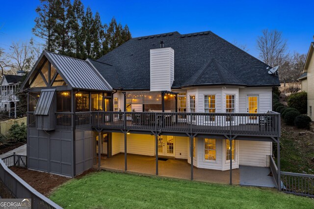 8625 Anchor On Lanier Ct, Gainesville, GA 30506 - back of house with a patio area, a deck, a yard, a chimney, and roof with shingles
