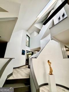 3810 Galloway Dr NE, Roswell, GA 30075 - staircase with wood finished floors