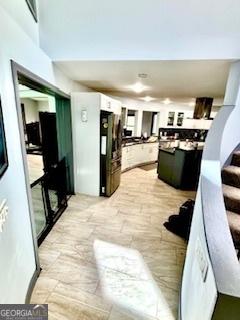 3810 Galloway Dr NE, Roswell, GA 30075 - living area with stone tile flooring