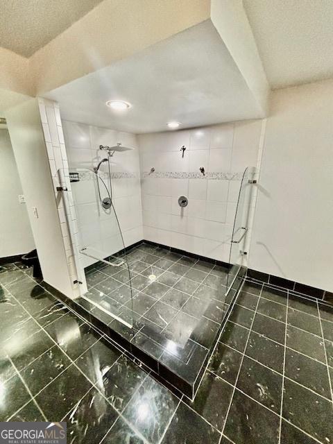 3810 Galloway Dr NE, Roswell, GA 30075 - bathroom featuring walk in shower, recessed lighting, and baseboards