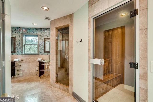 3810 Galloway Dr NE, Roswell, GA 30075 - bathroom with elevator, a stall shower, recessed lighting, and tile patterned floors