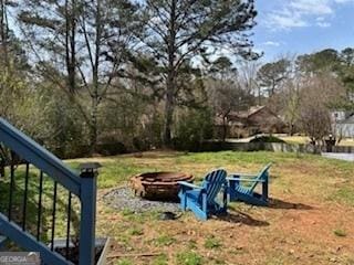 3810 Galloway Dr NE, Roswell, GA 30075 - view of yard with an outdoor fire pit