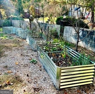 3810 Galloway Dr NE, Roswell, GA 30075 - view of yard featuring a garden and fence