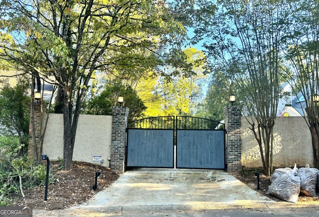 3810 Galloway Dr NE, Roswell, GA 30075 - gate featuring fence